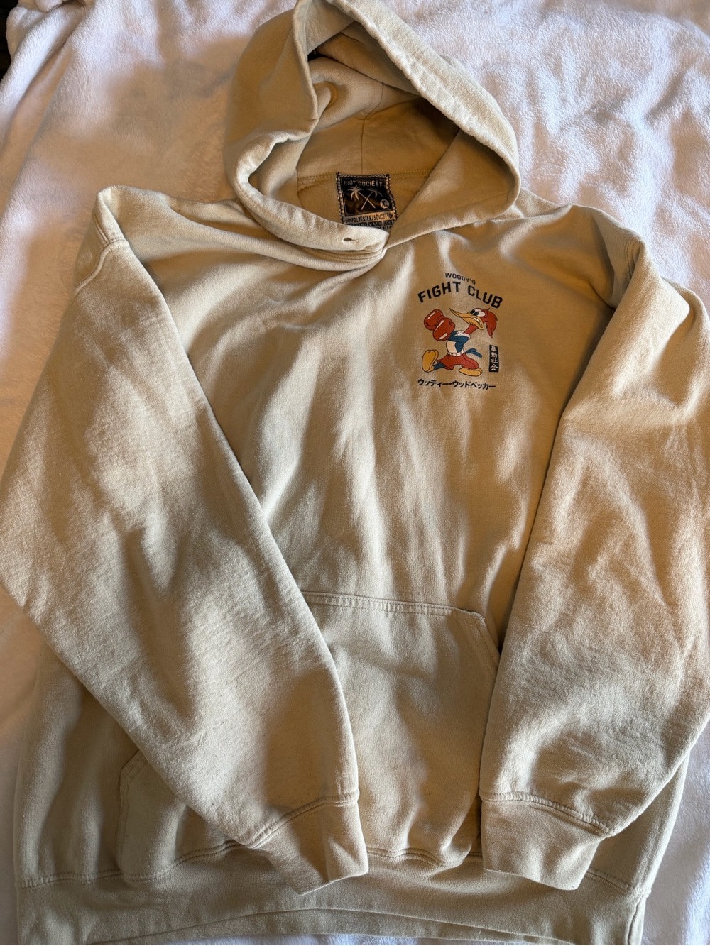 riot society beige and black pullover label hoodie